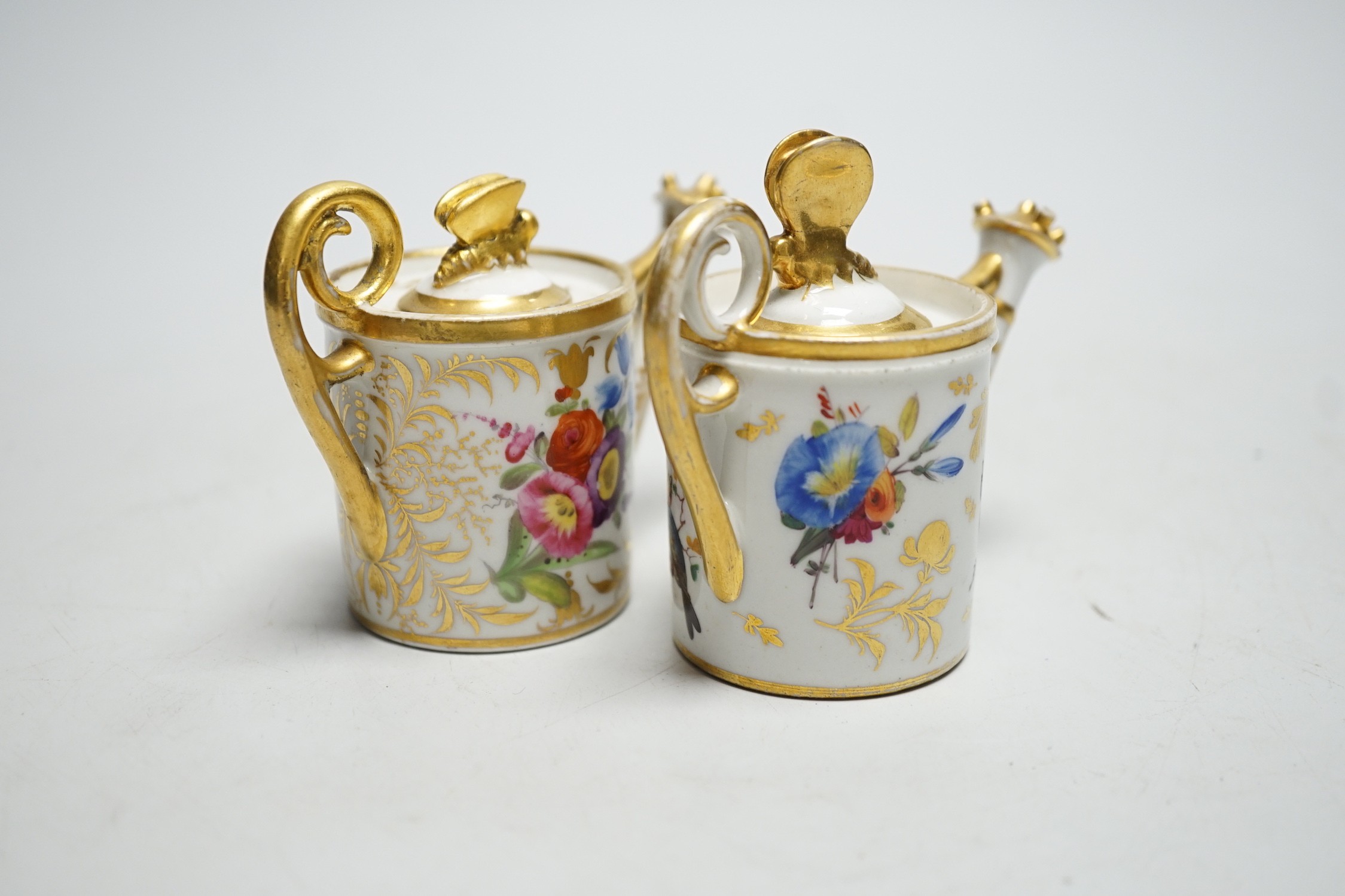 Toy porcelain: Two English porcelain rosewater sprinklers, c.1810, possibly Coalport, each modelled in the form of a watering can